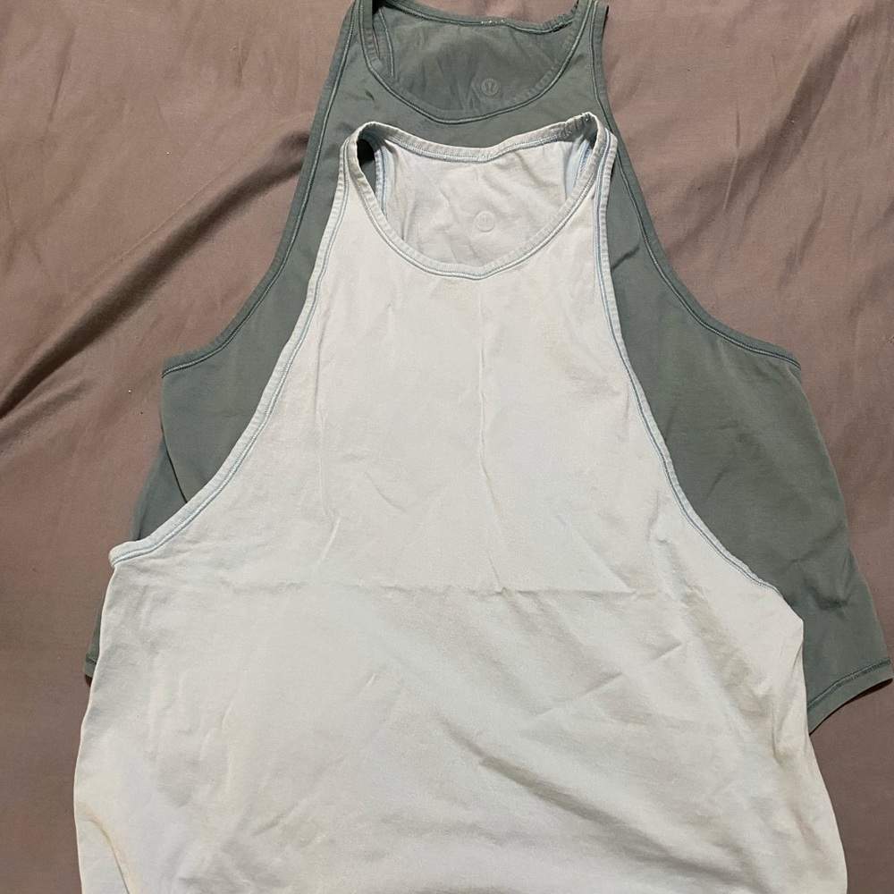 Pair of sweat date tanks